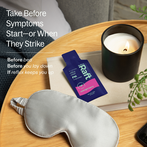 RefluxRaft To-Go Midnight Berry on nightstand — take before bed for nighttime acid reflux and heartburn relief